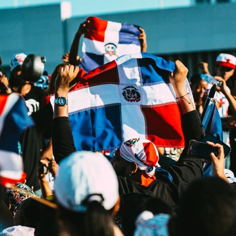 people in a stadium during daytime